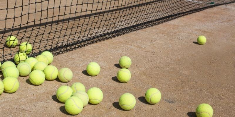 mass of tennis balls