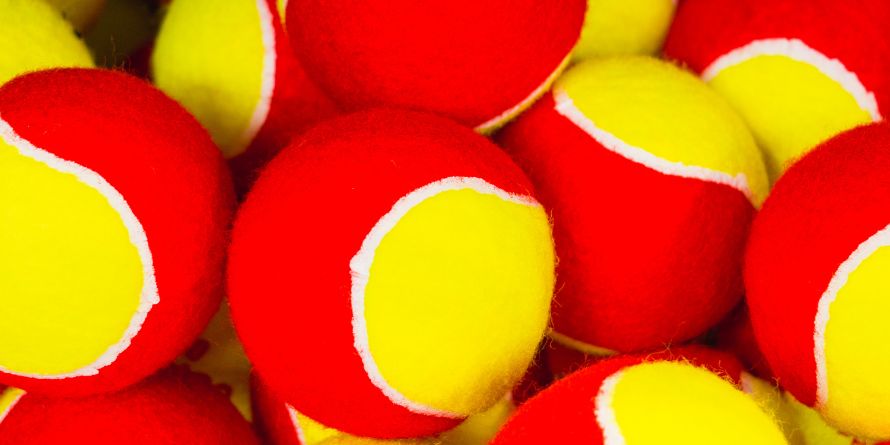 red dot tennis ball