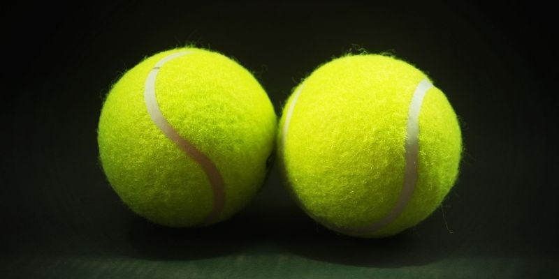 weight of tennis ball